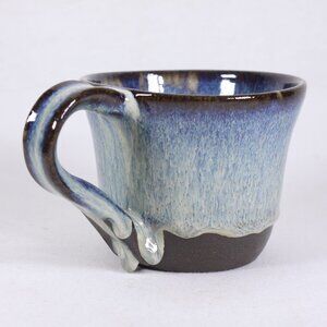 Handmade ceramic pottery mug with delicious drippy glaze